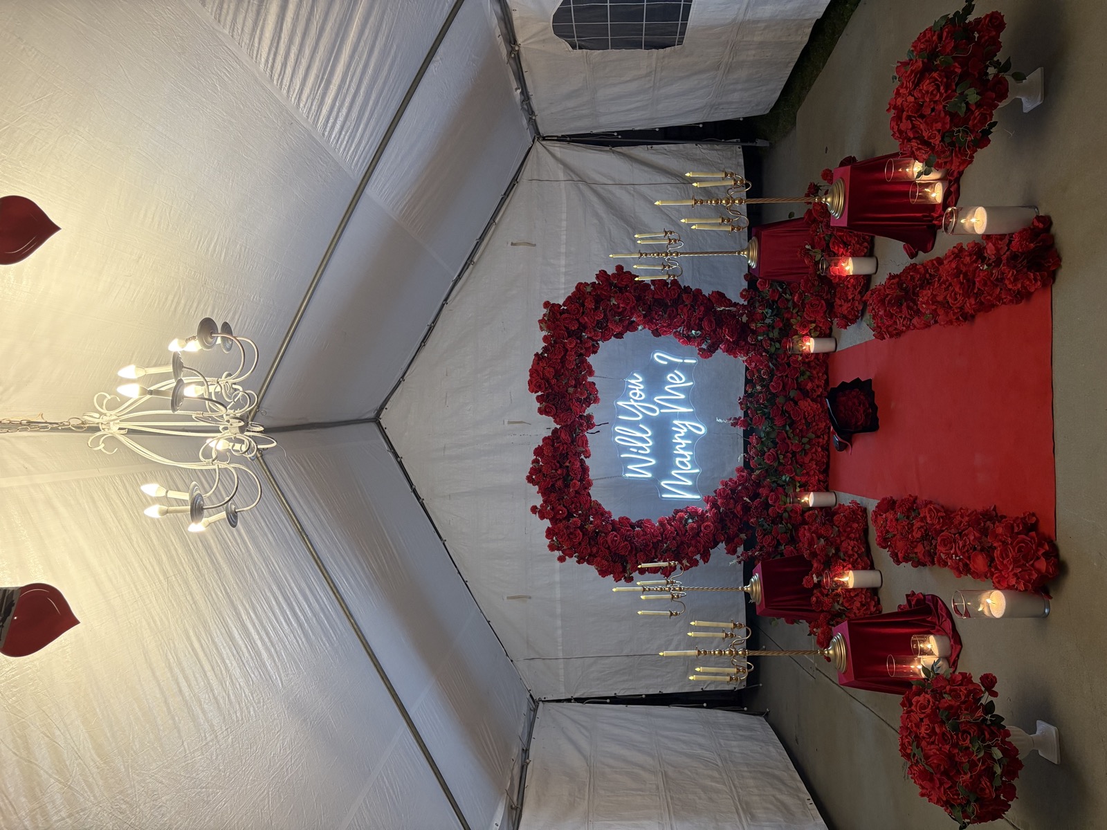 Backyard Intimate Setup — backyard intimate proposal with arch and candles